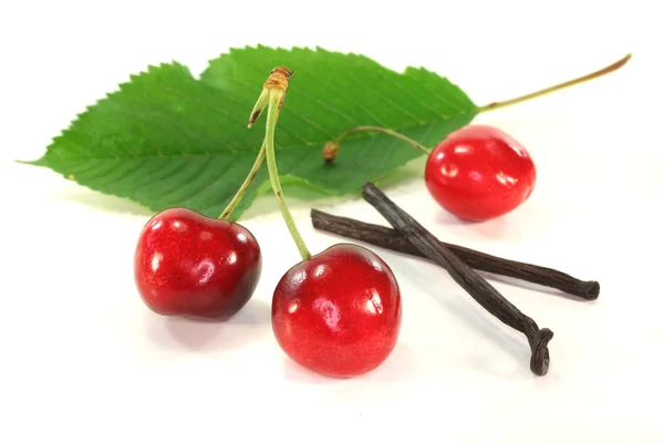 Cherries with vanilla — Stock Photo, Image