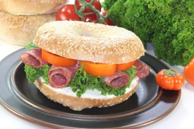 Bagel with salami clipart