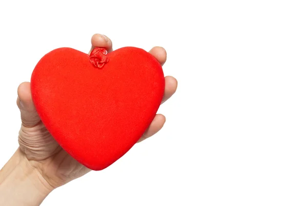 Gran corazón de San Valentín en una mano . —  Fotos de Stock