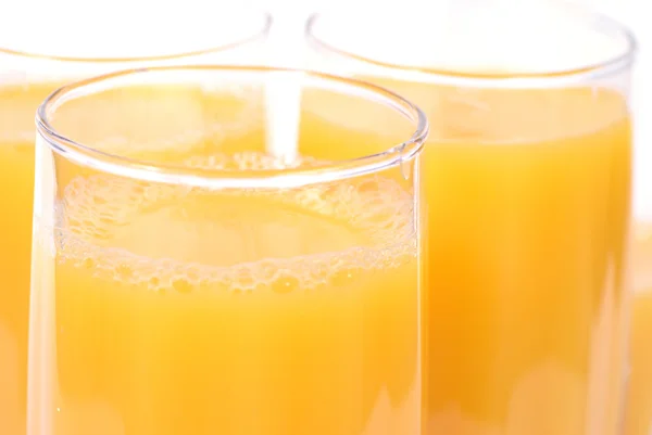 Óculos com suco de laranja — Fotografia de Stock