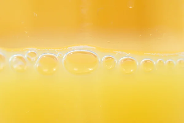 Makro pomerančová šťáva — Stock fotografie