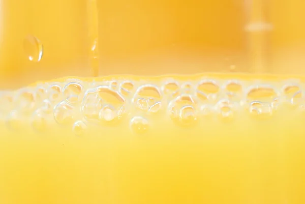 Suco de laranja macro — Fotografia de Stock