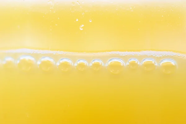 Macro orange juice — Stock Photo, Image