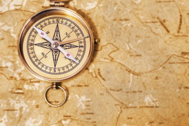 Compass on old map clipart