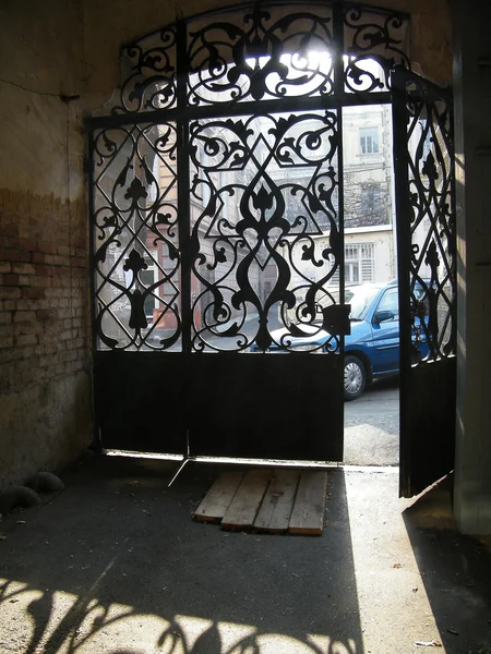 Iron door in the sun light — Stock Photo, Image