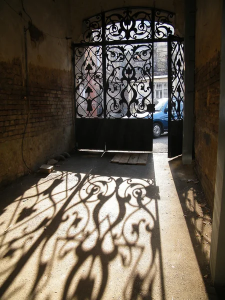 Iron door in the sun light — Stock Photo, Image