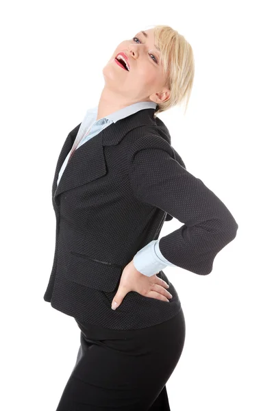Madura mujer de negocios con dolor de espalda . — Foto de Stock