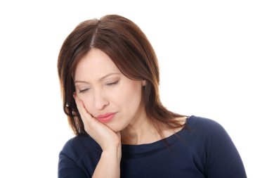 Woman having terrible tooth ache