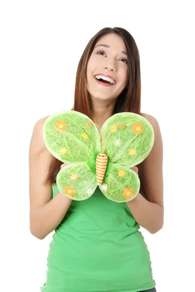 Молодая женщина с бабочкой — стоковое фото