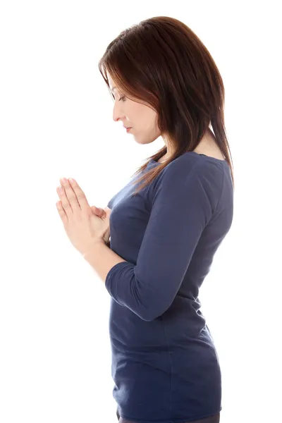 Жінка середнього віку молиться — стокове фото