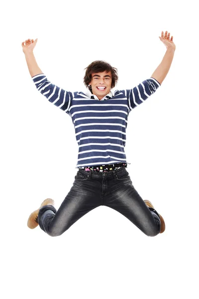 Joven hombre caucásico feliz saltando en el aire — Foto de Stock
