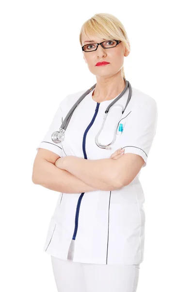 Zralý ženský lékař nebo zdravotní sestra — Stock fotografie