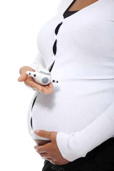 Gravid kvinna anläggning litet plan — Stockfoto
