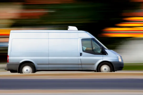 Hızlı mavi minibüs bulanıklık — Stok fotoğraf