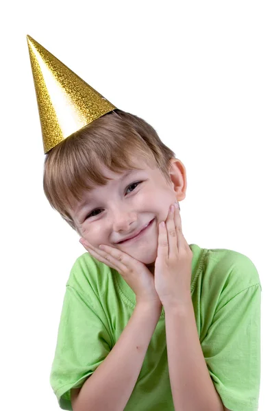 Χαρούμενα αγόρι σε ένα εορταστικό καπέλο — Φωτογραφία Αρχείου