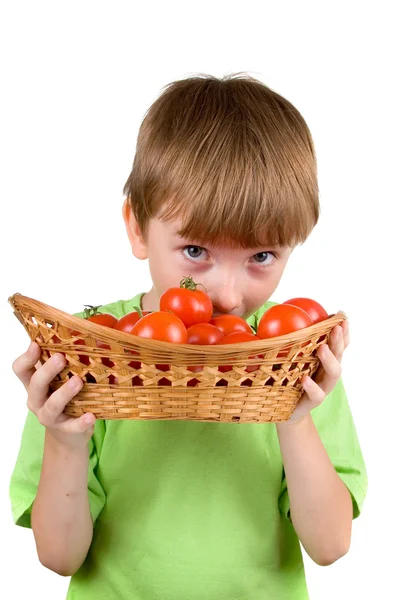 Boy with tomatoes — Stock Photo, Image