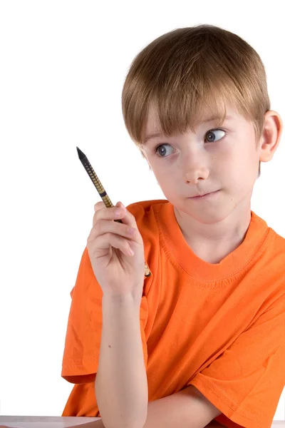 Wesoły chłopak z ołówkiem — Zdjęcie stockowe