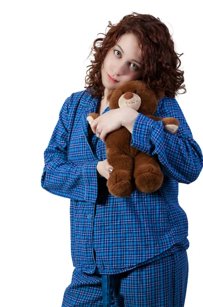 Frau umarmt Teddybär — Stockfoto