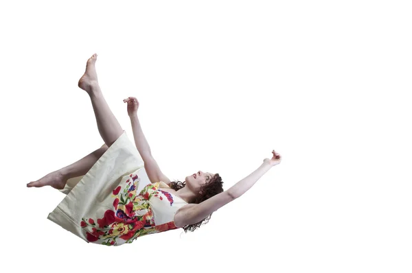 Vrouw die door de lucht valt — Stockfoto