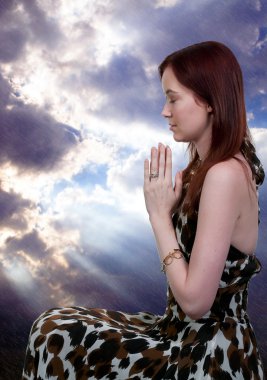 Woman praying clipart