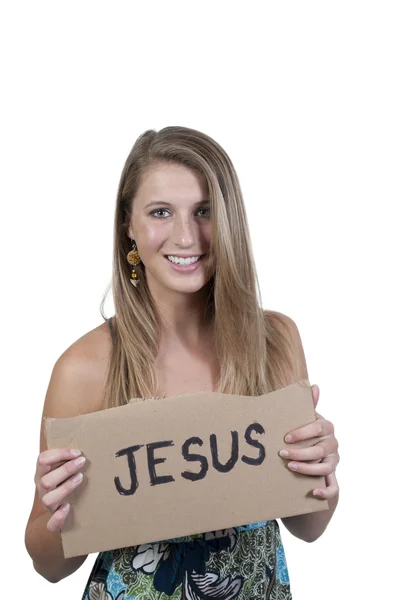 Жінка тримає знак Ісуса — стокове фото