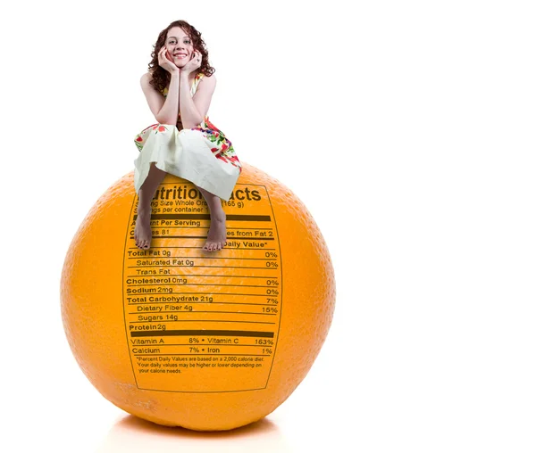 Žena oranžová výživa fakta — Stock fotografie
