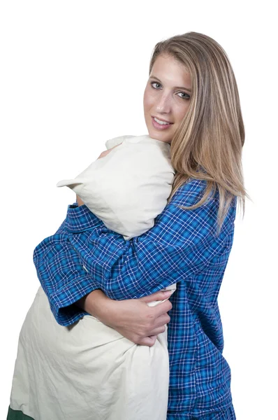 Женщина обнимает подушку — стоковое фото