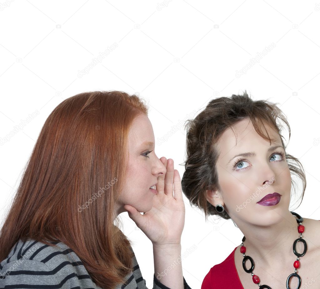 Woman whispering a secret