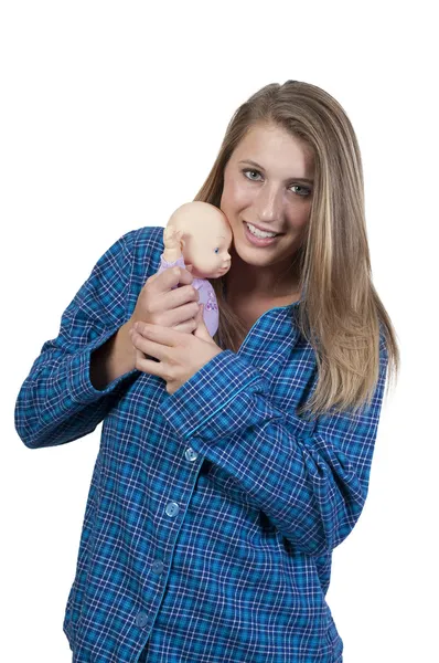 Hermosa mujer y muñeca bebé — Foto de Stock