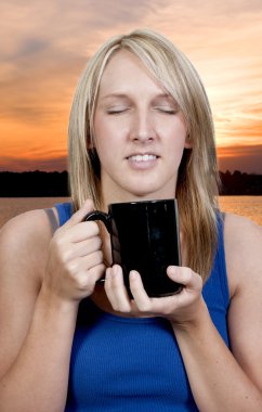 Woman Drinking Coffee clipart