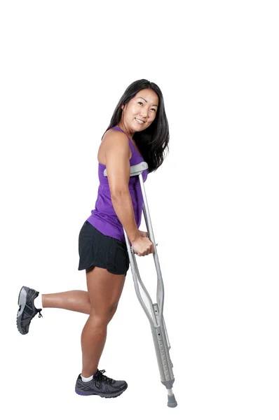 Asian Woman on Crutches — Stock Photo, Image