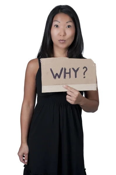 Женщина держит знак "почему" — стоковое фото
