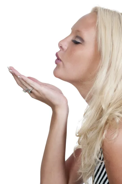 Woman Blowing a Kiss Stock Photo