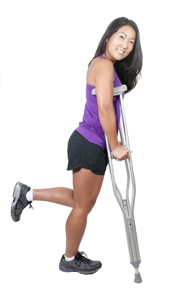 Asian Woman on Crutches — Stock Photo, Image