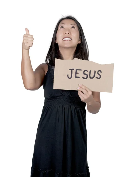イエス ・ キリストの記号を保持している女性 — ストック写真