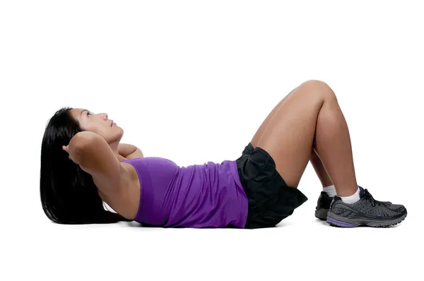 Asian Woman Doing Crunches Royalty Free Stock Photos