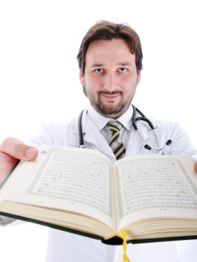 Muslim doctor with Koran in hands showing you open pages clipart