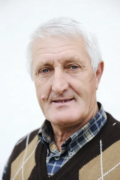Closeup Profile on a good looking smiling Old Man — Stock Photo, Image