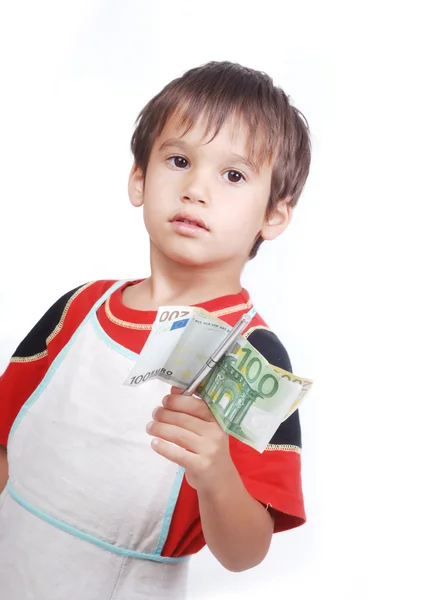 Malý chlapec hospodářství peníze — Stock fotografie