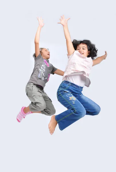 Due ragazze che saltano — Foto Stock