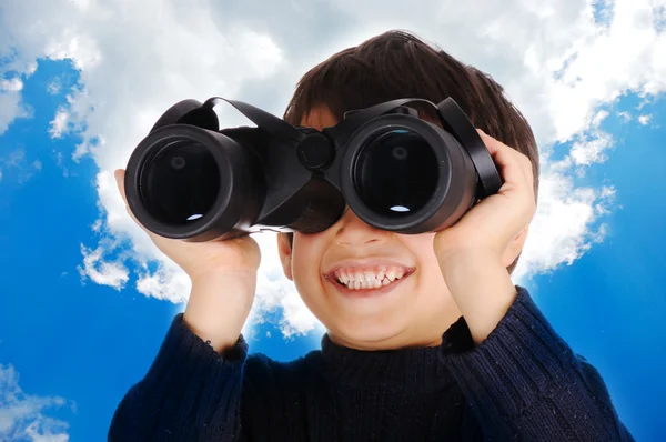 Little cute child with binoculars outdoor — Stock Photo, Image