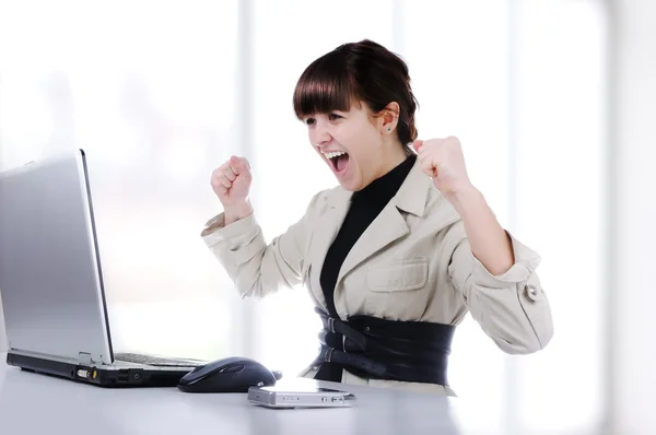 Excited young business woman with her clenched fist — Stock Photo, Image