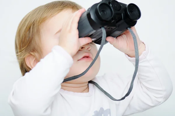 Baby with binoculars, closeup — Stock Photo, Image
