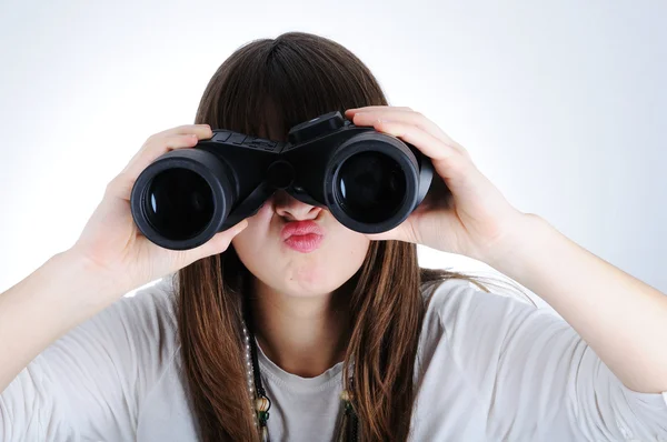 Angry female with a binoculars — Stock Photo, Image