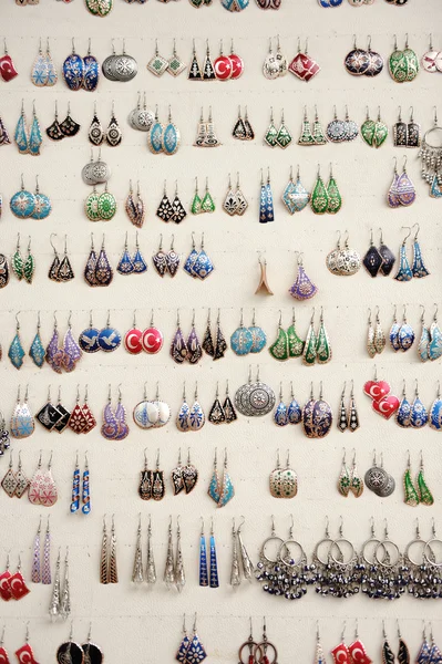 Ear rings on white background — Stock Photo, Image