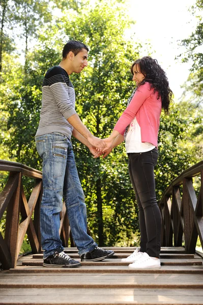 Beautiful scene of two teen lovers in nature, young couple together — Stock Photo, Image
