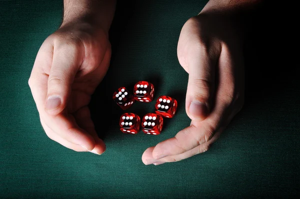 In casino, gambling, human hands, cubes — Stock Photo, Image