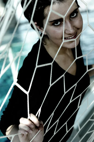 Girl stuck in net