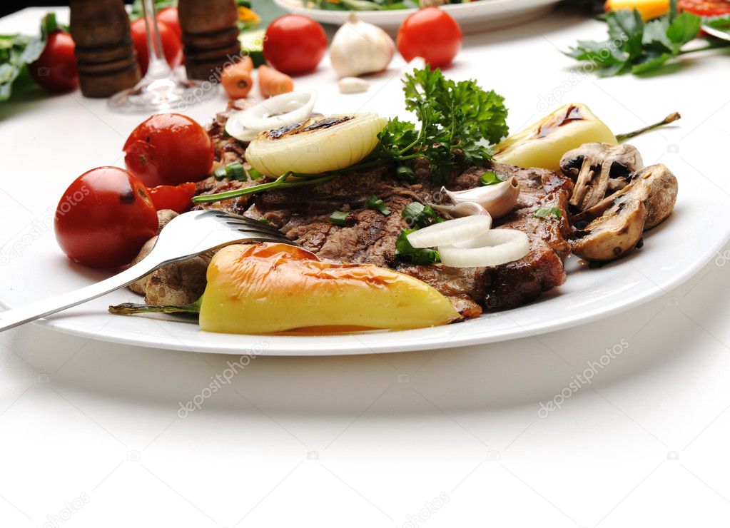 Delicious prepared and decorated food on table