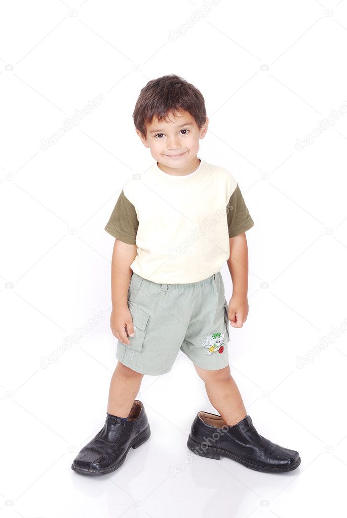 Little boy in big shoes Stock Photo by ©zurijeta 6150452
